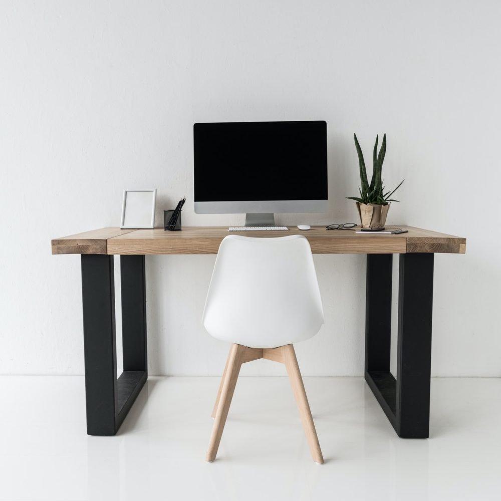 workplace-with-computer-and-stylish-furniture-in-modern-office-2